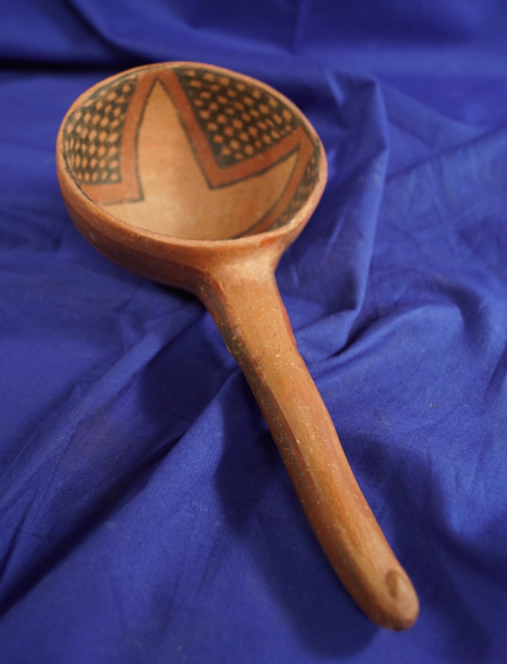 8 7/8" Long Anasazi-Kayenta Polychrome Ladle that is broken and glued with repair in one spot.