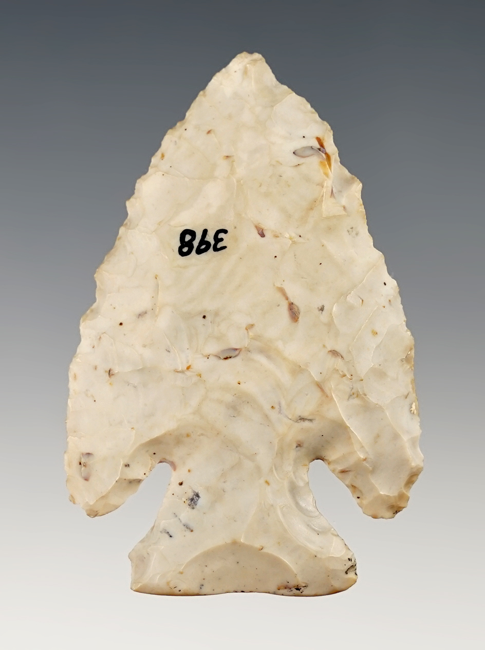 2 5/16" Thebes point with heavy ancient grinding to the base. Found in Hardin Co., Ohio.