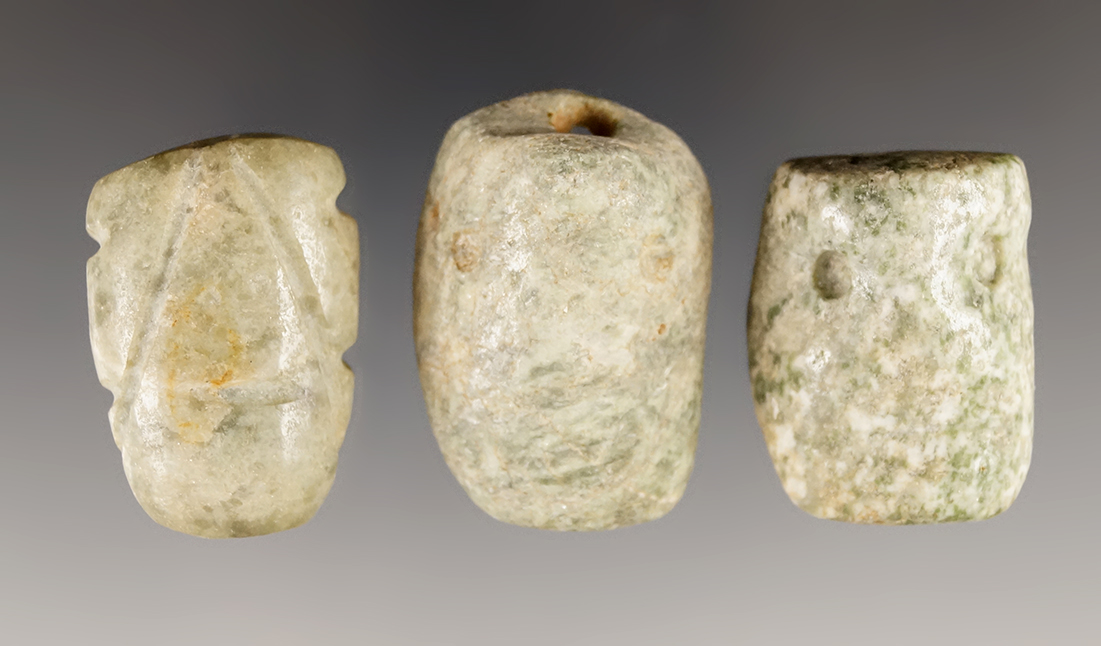 Set of three nicely carved Pre-Columbian face effigy beads found in Mesoamerica.