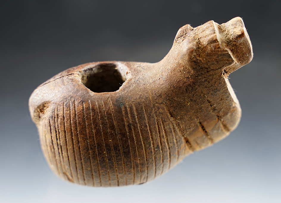 Excellent detail on this 3 3/8" hand carved wood Alpaca Canopa found in Peru.