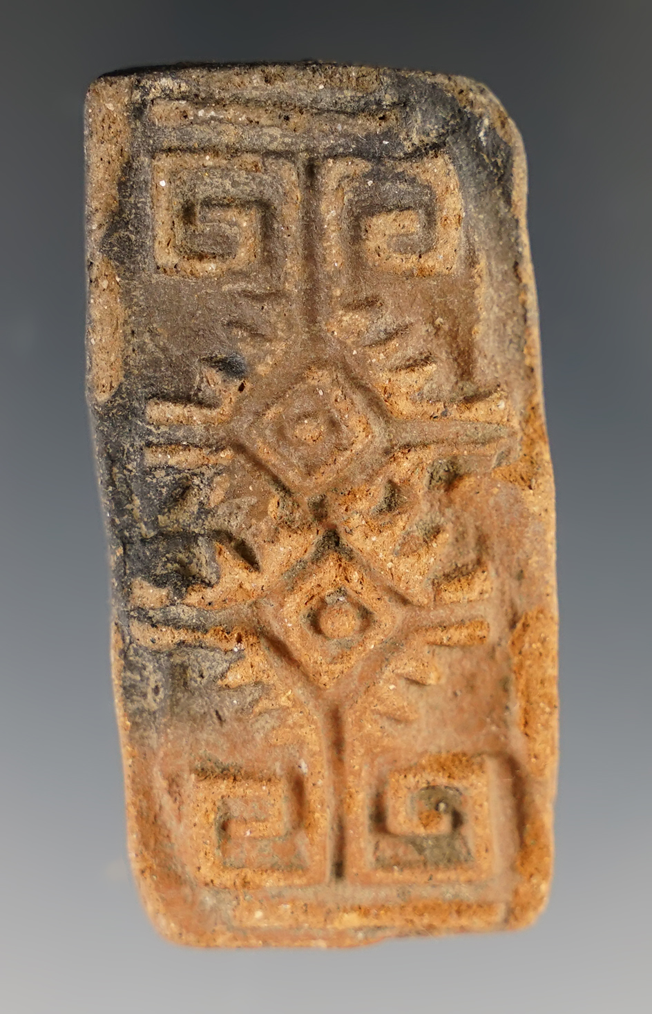 2 1/8" Pre-Columbian clay stamp in excellent condition.
