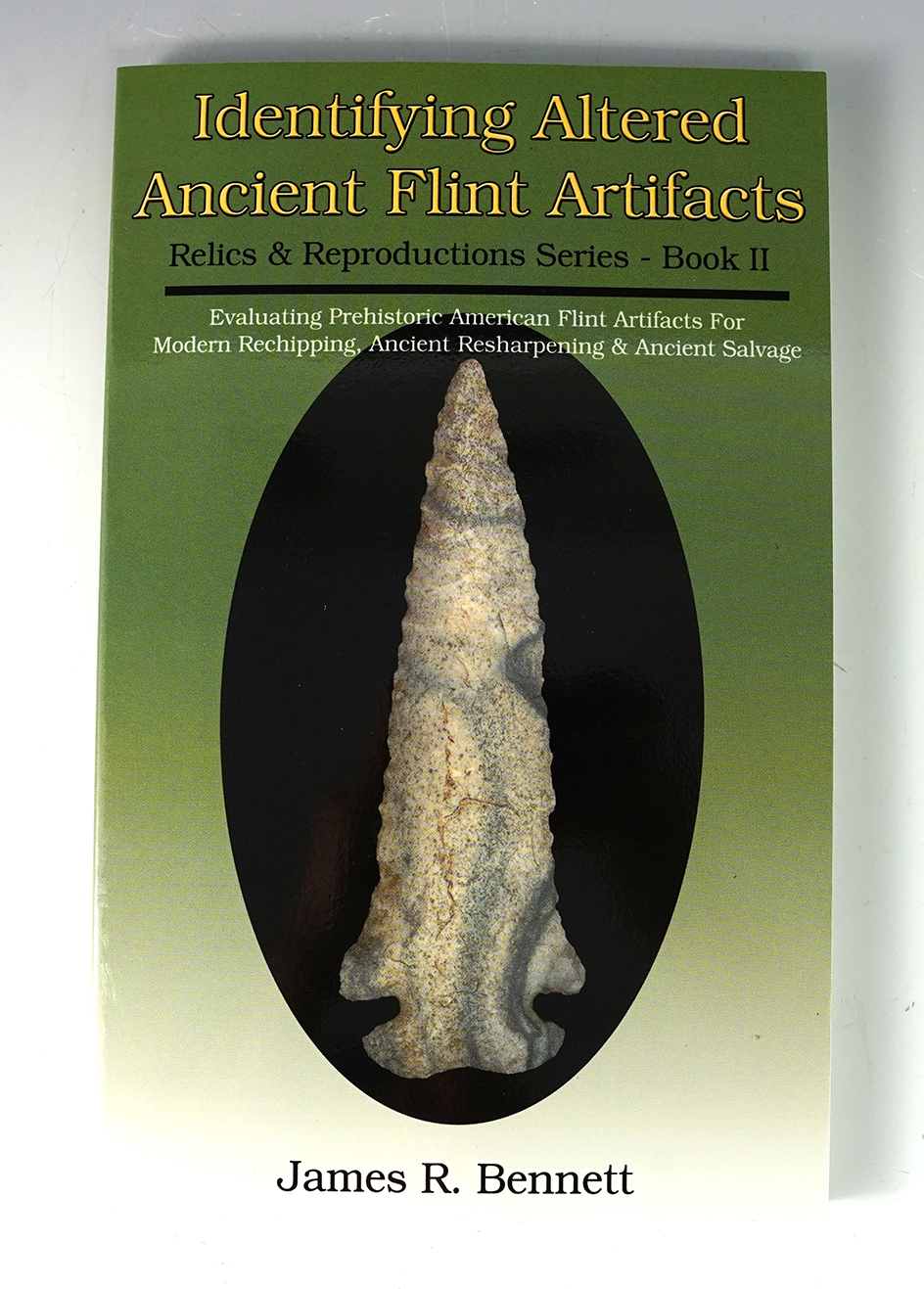 Softcover book in new condition  "Identifying altered ancient Flint artifacts" by James R. Bennett