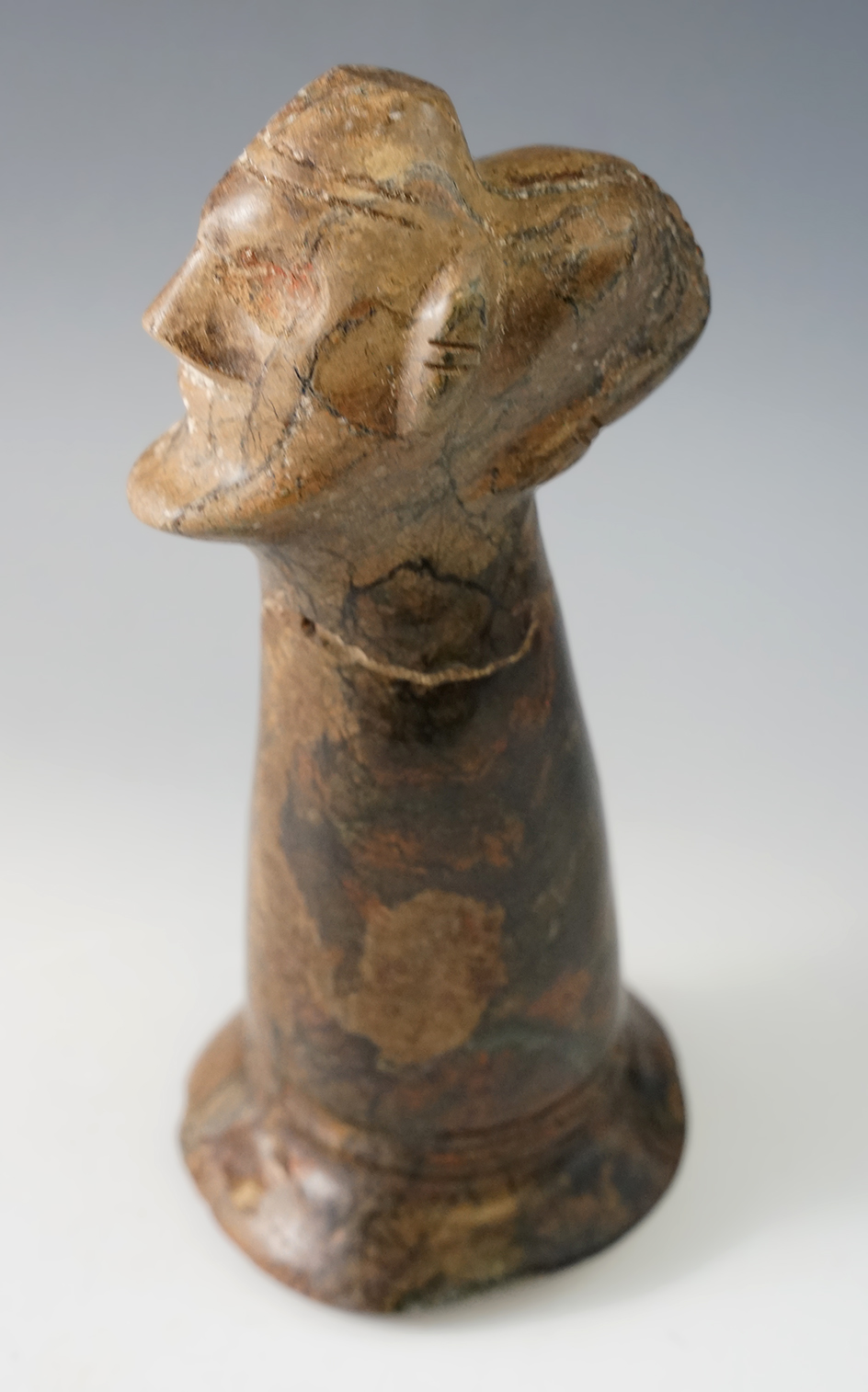 7 3/8" Tall Zemi Pestle with human face, broken and glued, found in Puerto Rico.