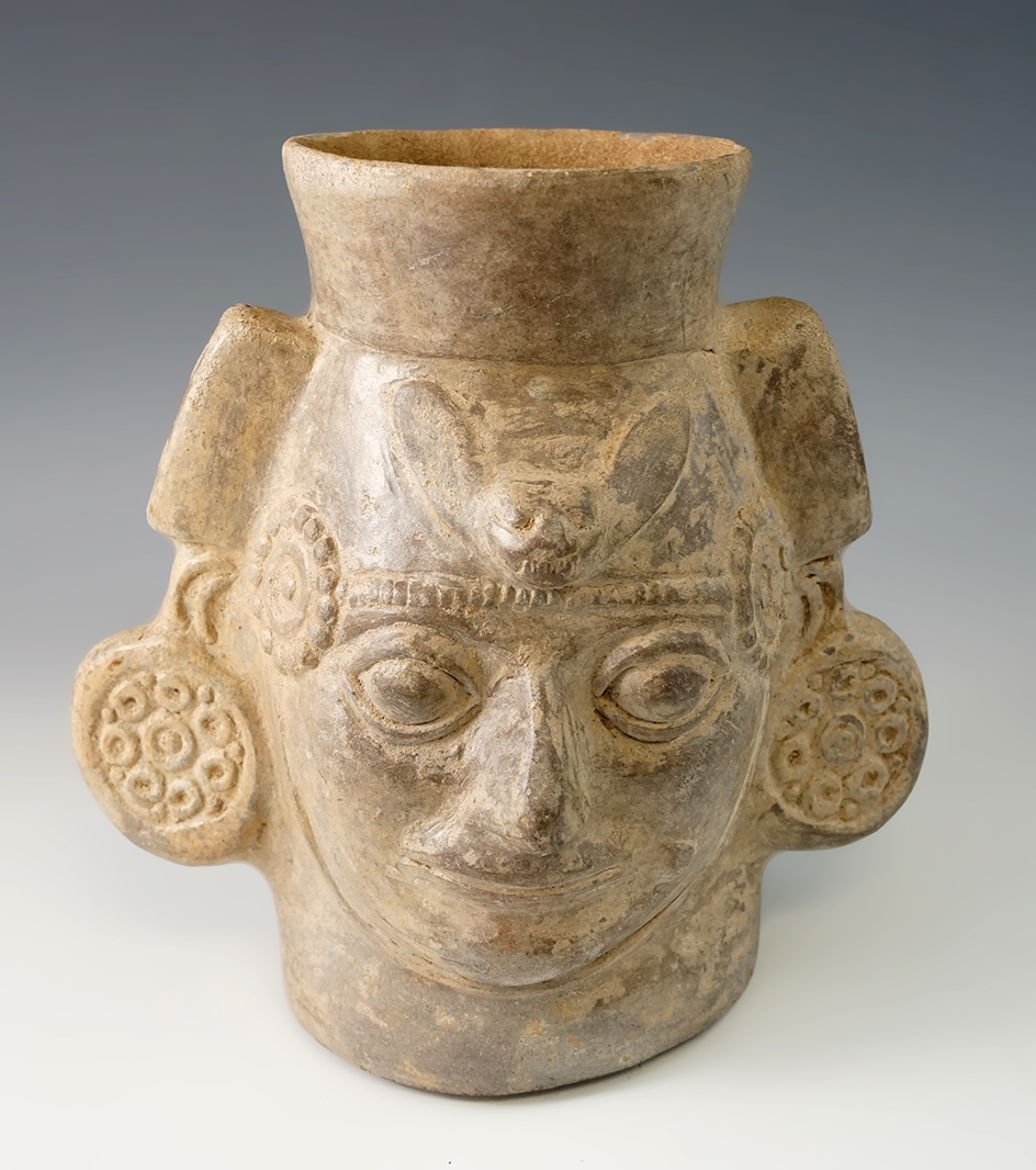 Pre-Columbian Sican head pot in excellent condition made from fired clay that is 6 3/4" tall.