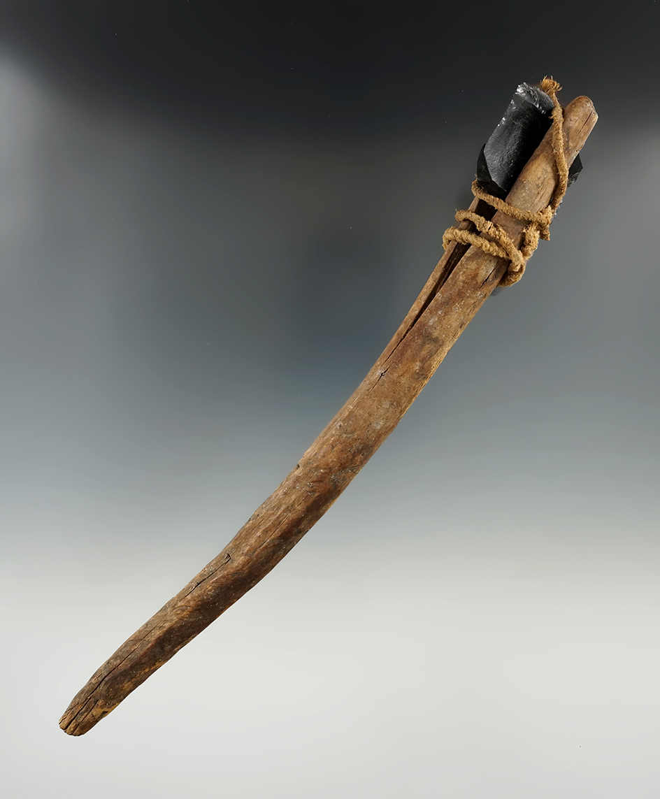 9 5/8" tall obsidian tool with a split wood handle and original cordage found in Pisac Peru.