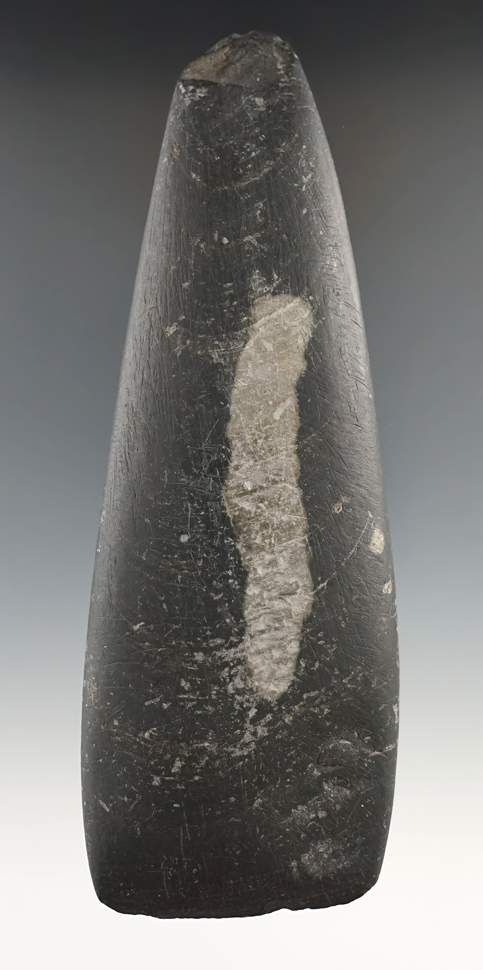 5 13/16" tapered poll Celt that is nicely made from black slate found in Ohio.