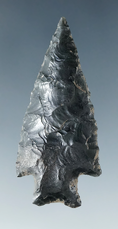 Excellent style on this 1 13/16" Merrybell type I made from obsidian. Found at the Maybe site.