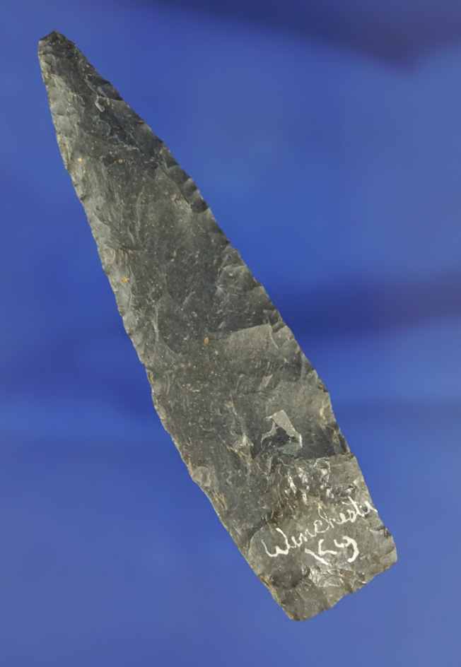 3 3/8" Lanceolate with a heavily ground stem area found in Winchester, Kentucky.