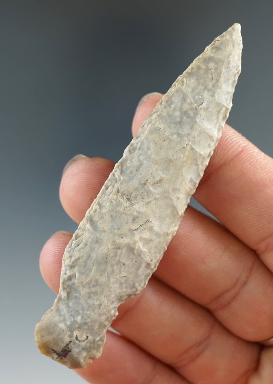 Uniquely styled 3 1/8" stemmed point found in Texas.