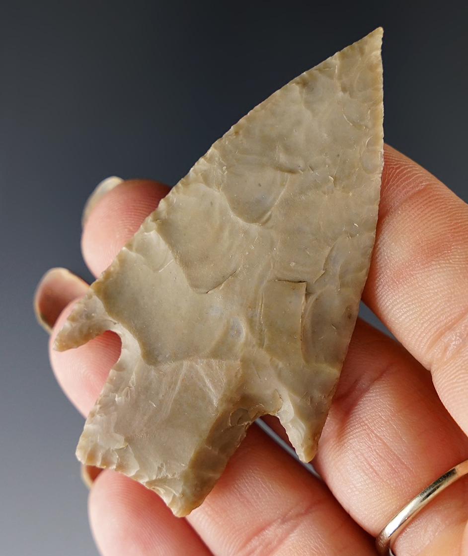 2 9/16" Texas Stemmed point that is thin with great flaking. Ex. Mark Van Horne Collection.