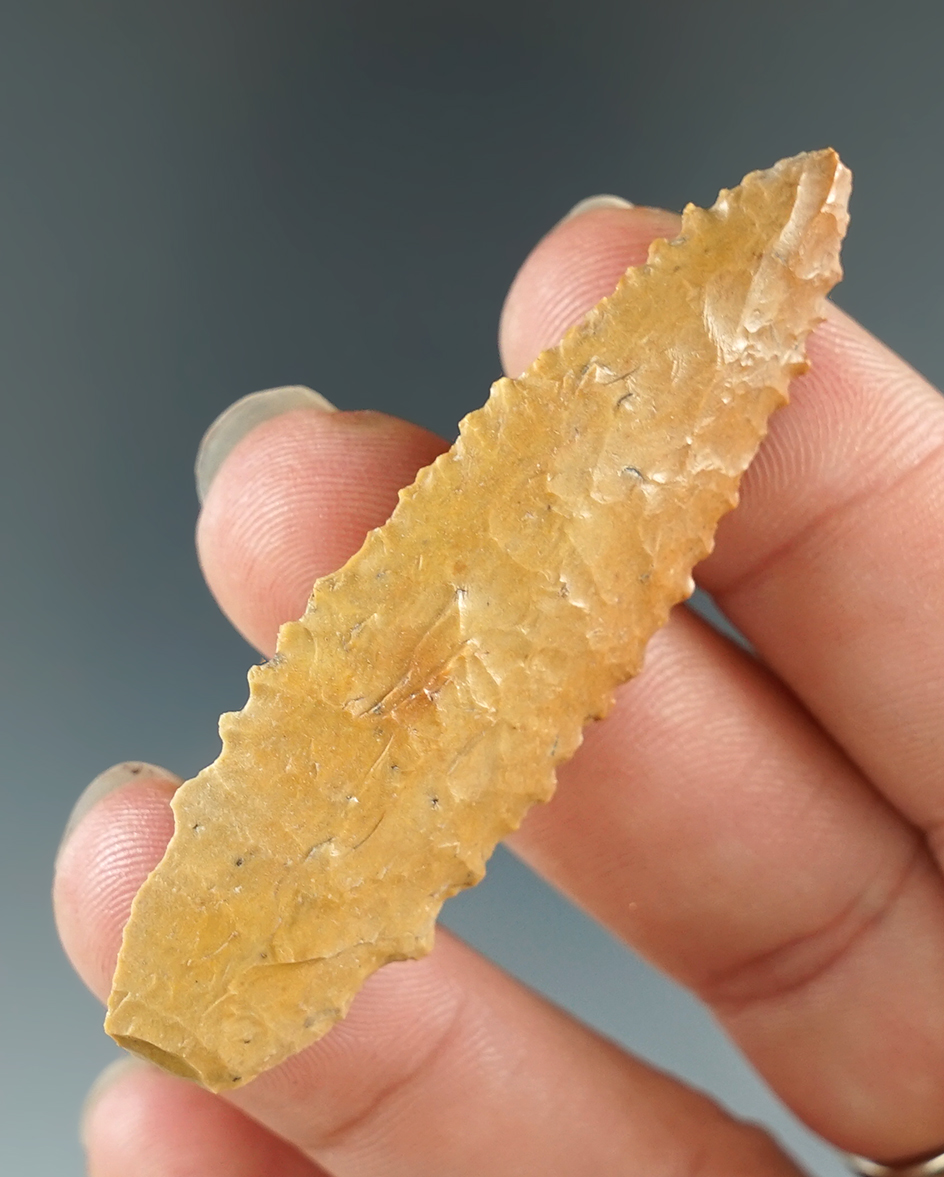 2 3/8" Serrated Cascade made from Jasper, found in Klickitat Co., Washington. Bennett COA.