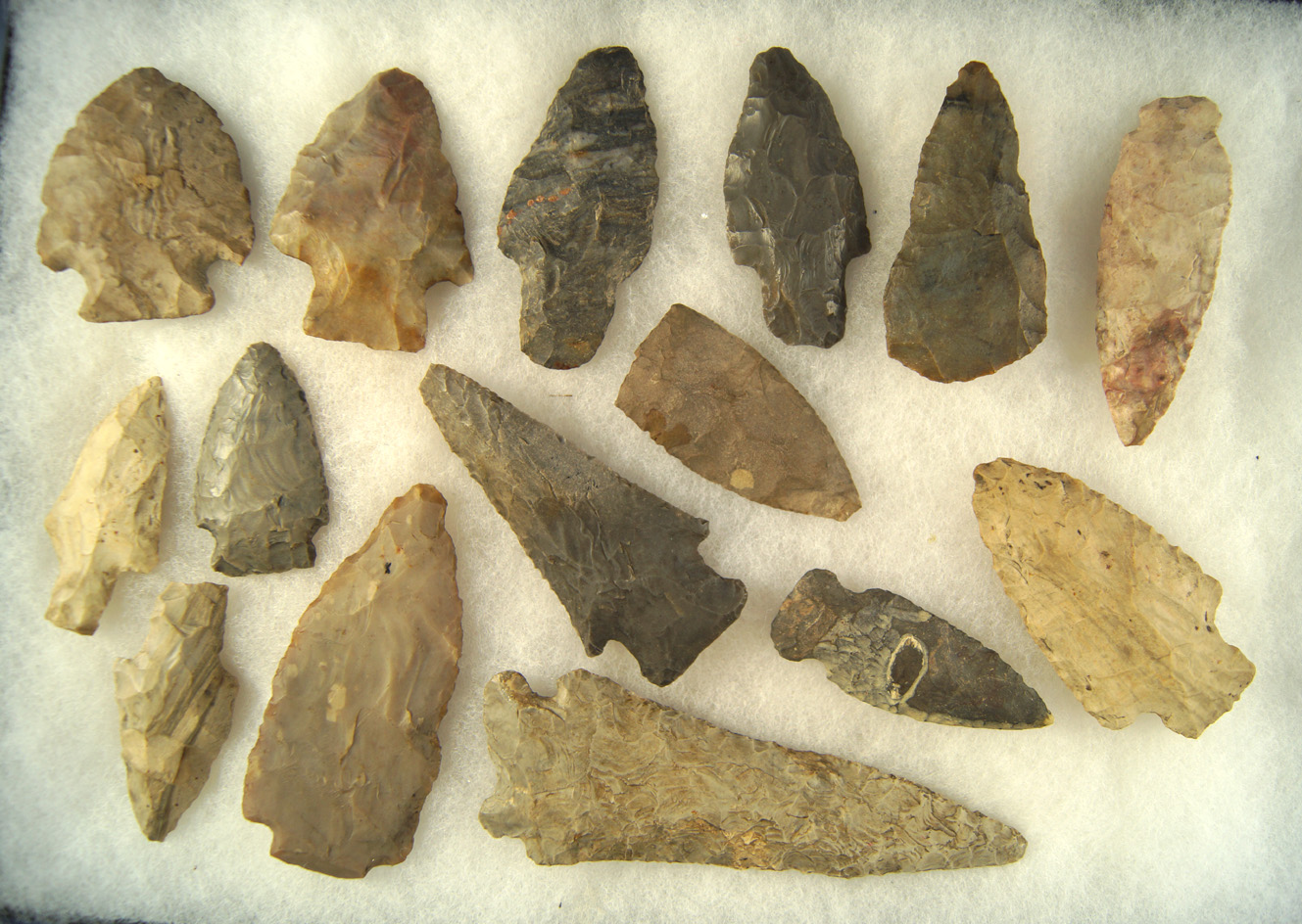 Group of 15 assorted Flint arrowheads and knives from the Midwest, largest is 4 5/8". Ex. Cowan Hood