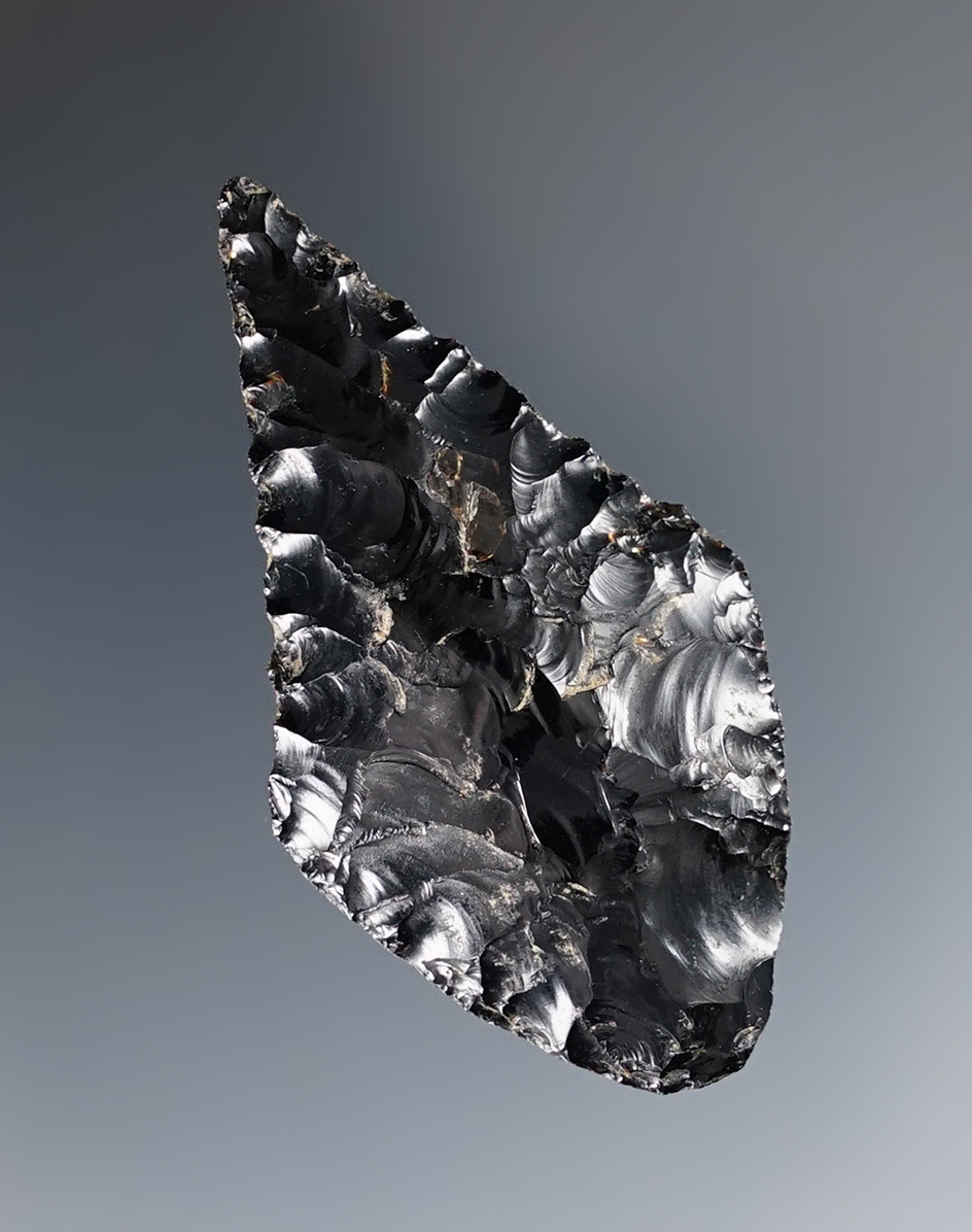 1 15/16" Wahmuza Knife made from obsidian with excellent flaking. Ex. C.L. Pugh Museum. 