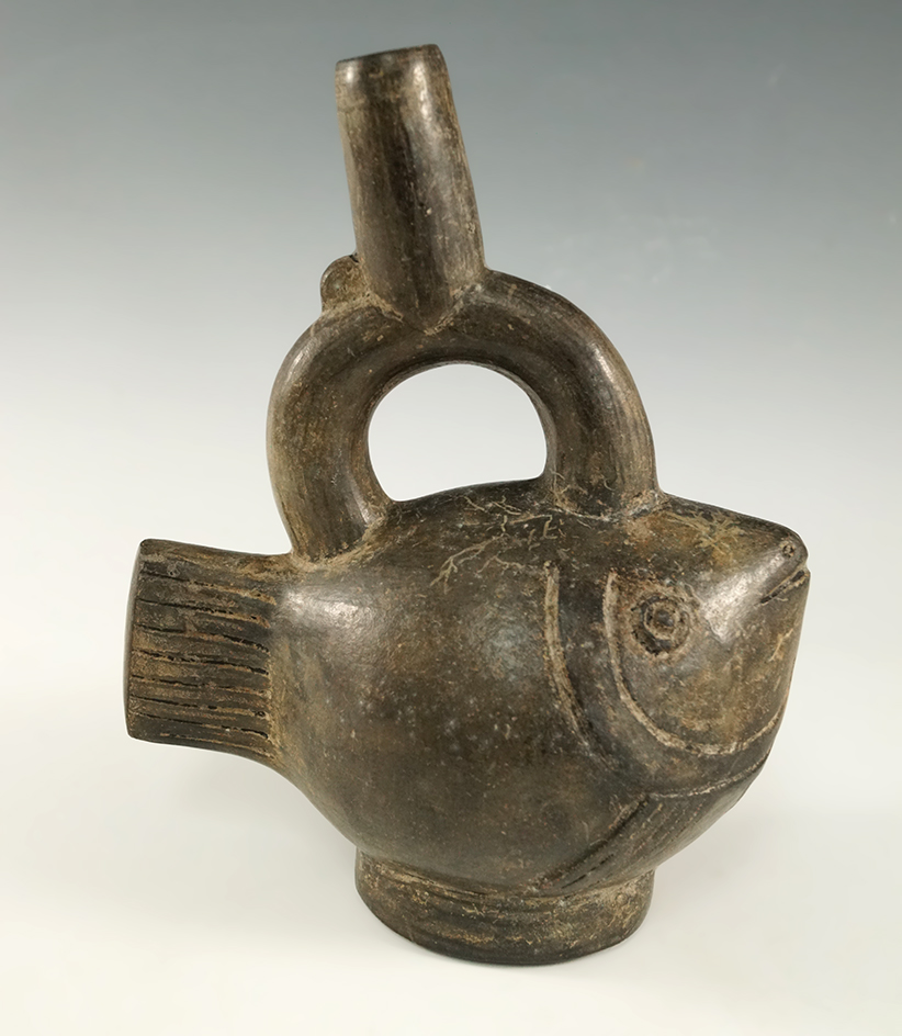6 7/8" tall by 5 1/4" wide Chimu culture fish effigy stirrup bottle with pedestal base.  Peru.