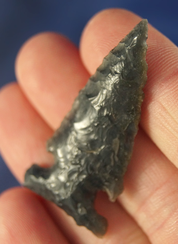 1 11/16" well patinated and nicely styled Obsidian side Notch point found in Oregon.