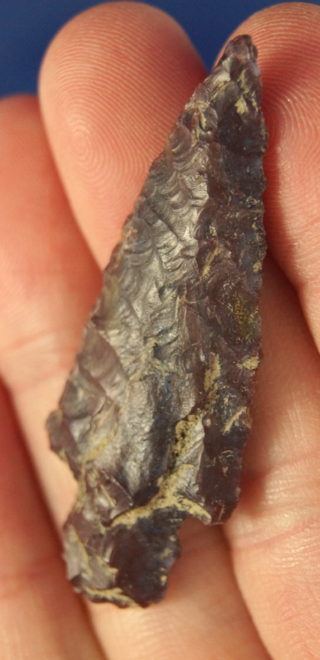 Excellent flaking and beautiful multicolored material on this 1 7/8" Stemmed Dart Point