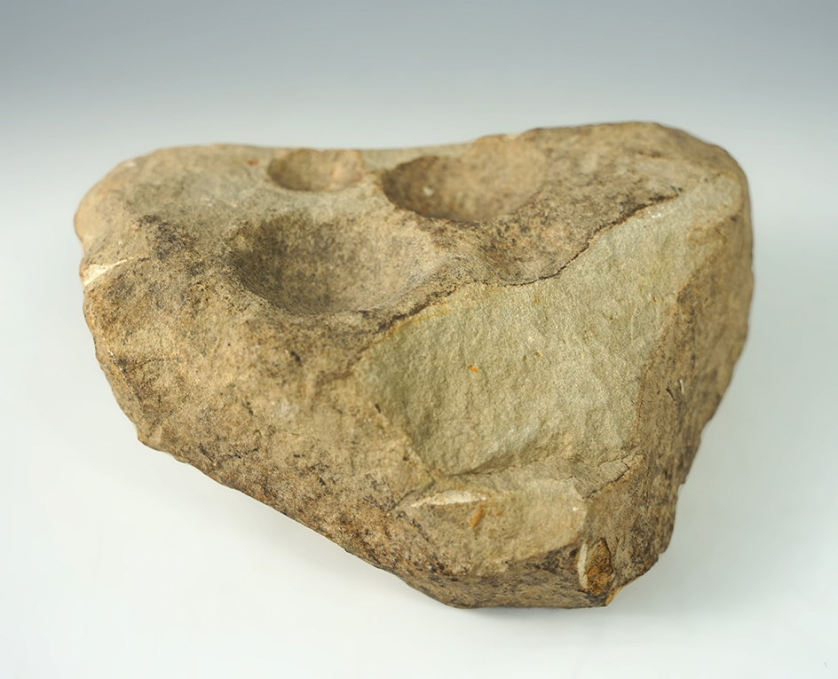 5 1/4" Nutting Stone with divets on both sides.