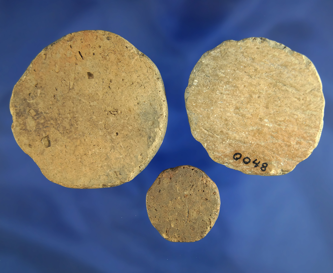 Set of three Fort Ancient culture pottery discs found near the Ohio River, southern Ohio.
