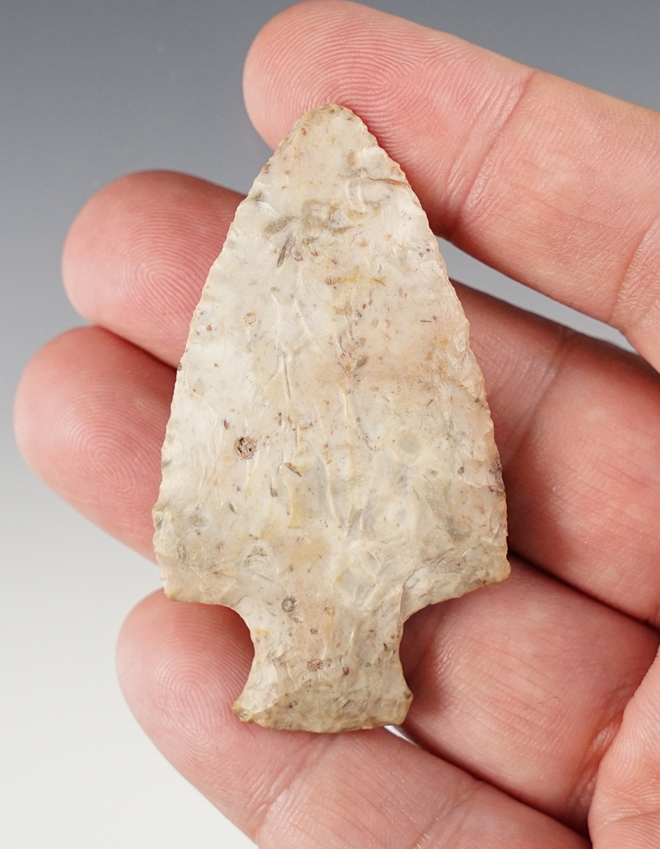Well patinated 2 7/16" bottleneck point made from Flint Ridge Flint found in Ohio.
