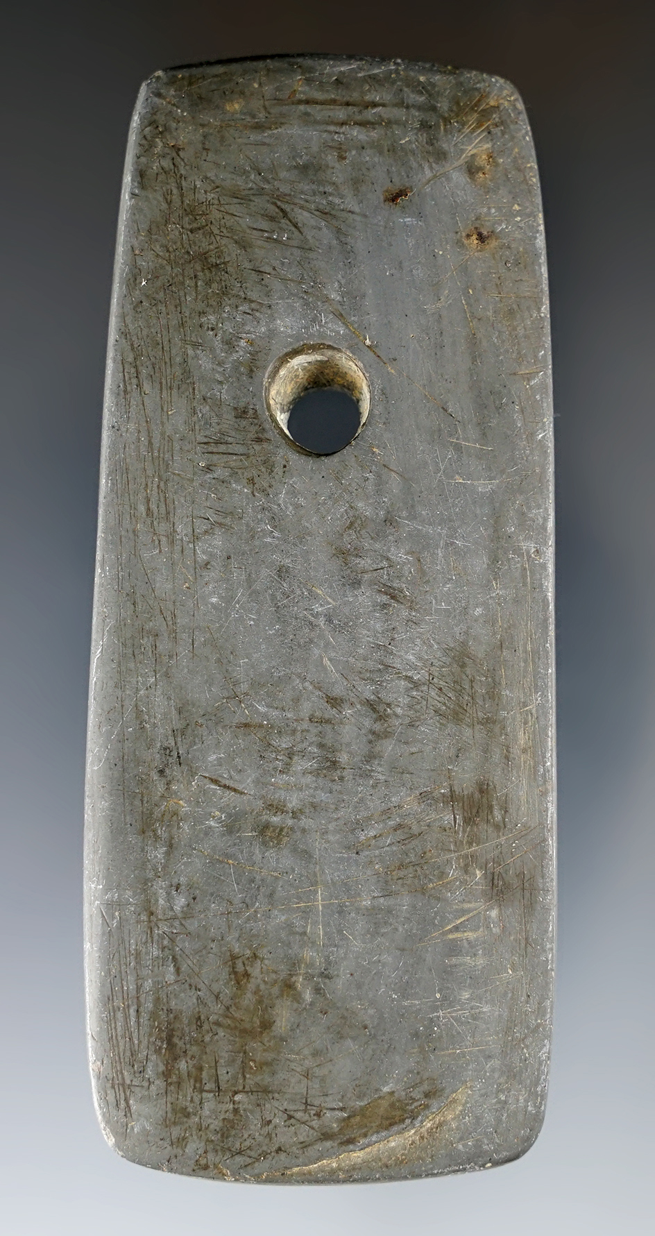 3 13/16" Adena Trapezoidal Pendant made from gray and black Banded Slate - Richland Co., Ohio.