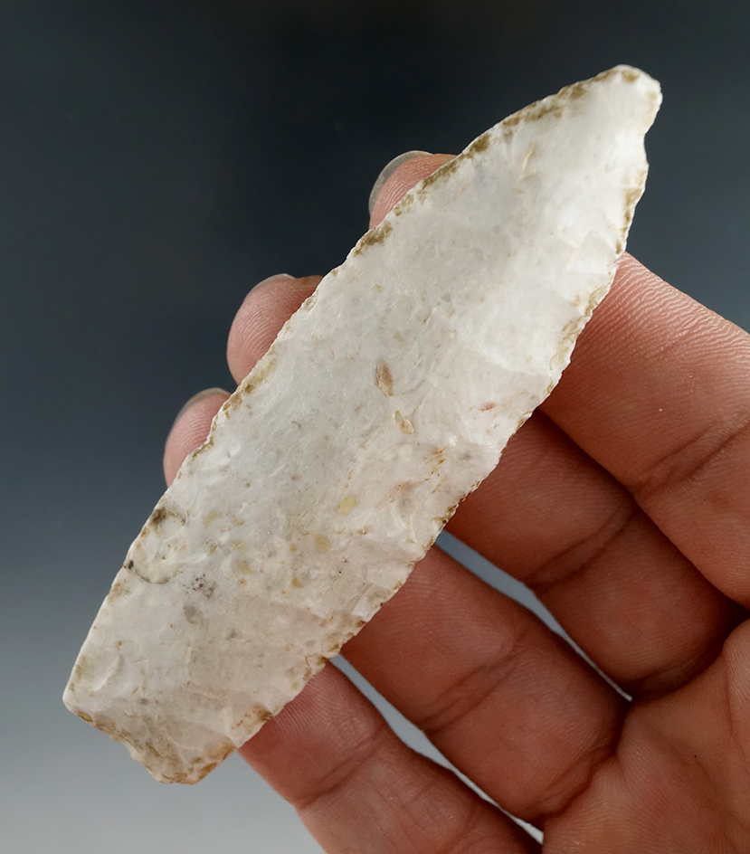 Excellent lower edge grinding on this 3 1/4" Agate Basin that is heavily patinated. Found in Illinoi