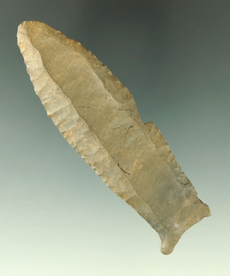 3 9/16" Paleo Cumberland which is fluted on each side nearly to the tip. Found in Pulaski Co., KY.