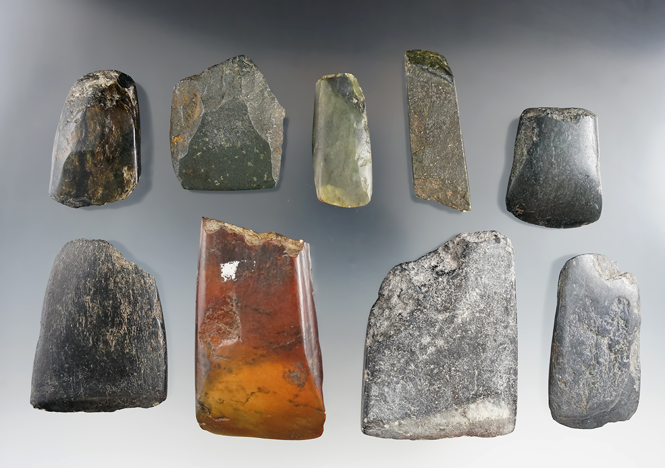 Group of nine assorted stone and jadeite tools found in this Pacific Northwest,