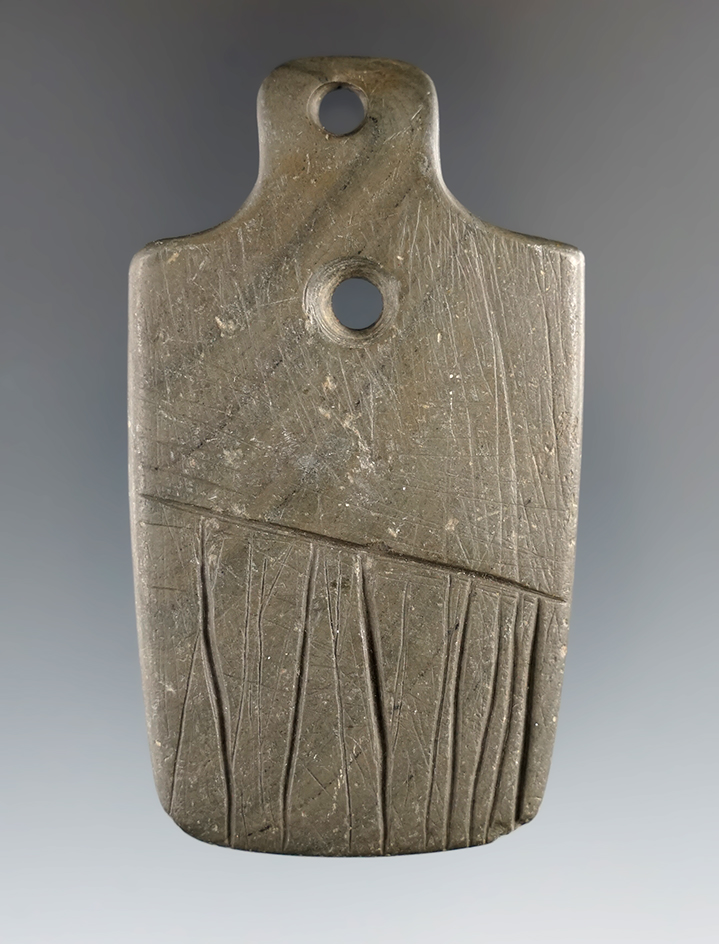 2 7/8" Eclectic Gorget that is heavily engraved, made from Banded Slate. Found in Clark Co., Ohio.