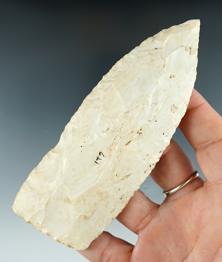 4 3/4"  Blade with good deposits on surface. One small burin fracture to one side of tip. Missouri.