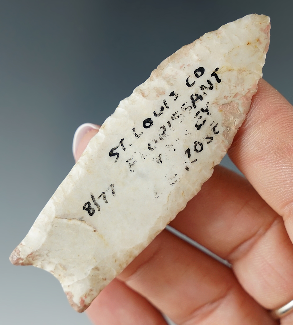 2 3/4" Paleo Fluted Clovis with minor restoration to basal ears and a couple small side nicks. COA