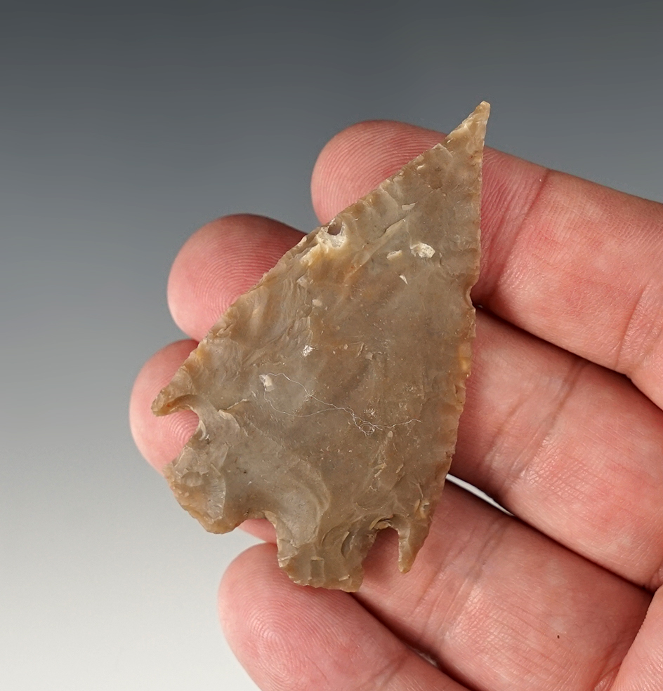 2 7/16" Montell made from brown chert. Found in Real Co., Texas. Comes with a Rogers COA.