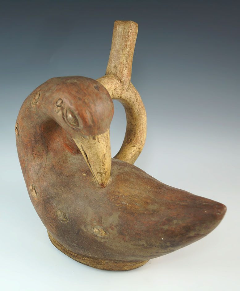 9 1/2" long Moche stirrup handle duck effigy pot. Found in Peru.  Len Weidner Collection.
