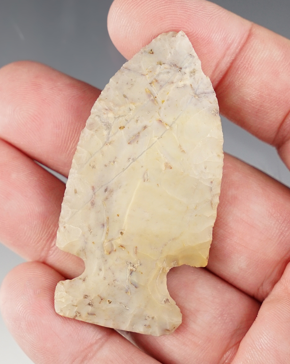 2 7/16" Archaic Sidenotch Point made of lavender and cream Flint Ridge. Found in Ohio.