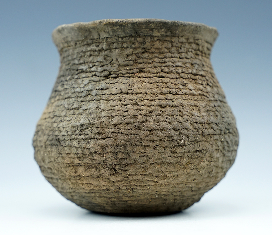 Excellent style on this 4 1/4" Wide Corrugated Pottery Vessel. Found in New Mexico.