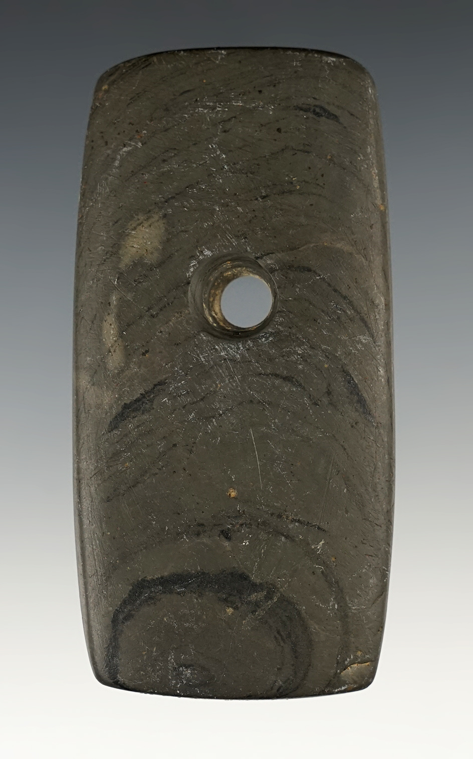 3 7/16" Adena Tablet Pendant made from green and black Banded Slate. Ex. Dan Hall Collection.
