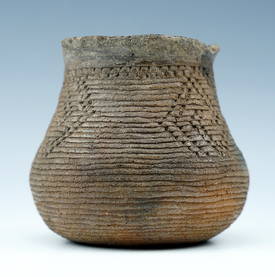 Excellent exterior design 3 1/16" Tall Ancient Pottery Vessel from New Mexico.