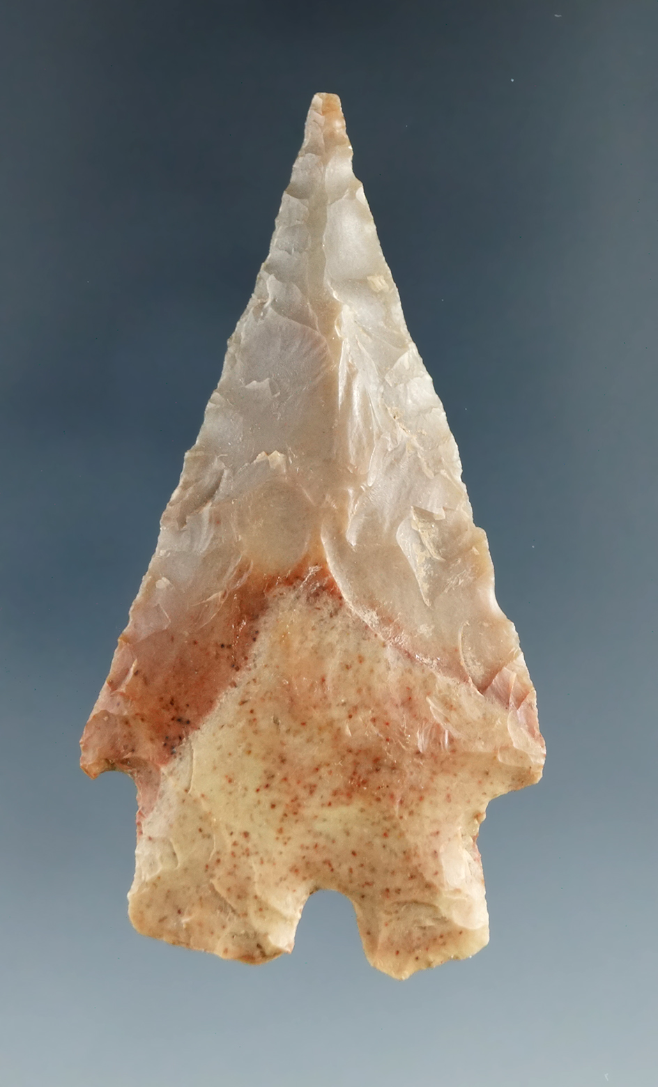 2 7/16" Montell made from attractive gray, tan and red speckled chert found in central Texas.