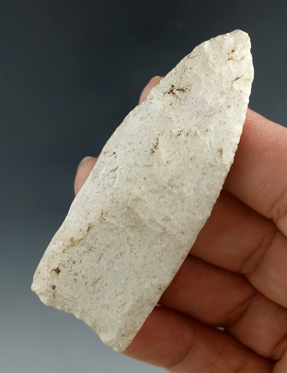 2 3/4" Paleo Clovis made from Burlington Flint, found in Franklin Co., Missouri. Davis COA.