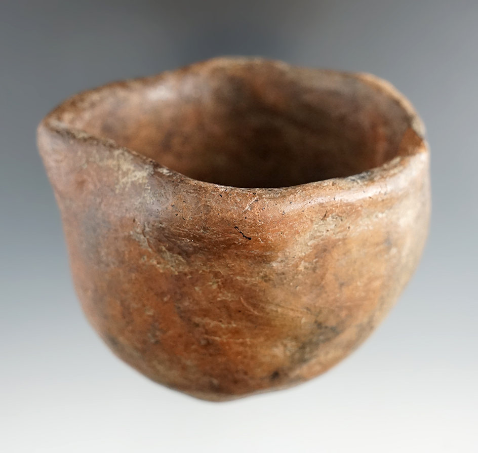 2 1/4" pottery vessel found in Tennessee.