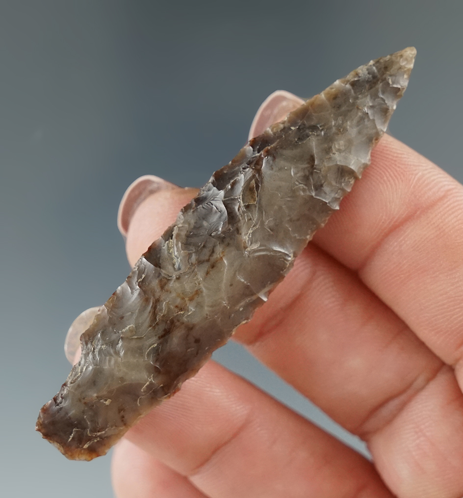 2 9/16" beautifully styled stemmed projectile point found in Oregon - attractive material.