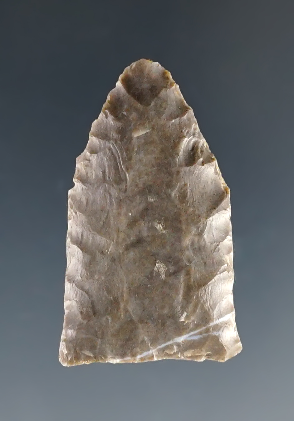 1 3/8" Paleo Clovis finely made and great flutes. Found in Adams Co., Ohio.