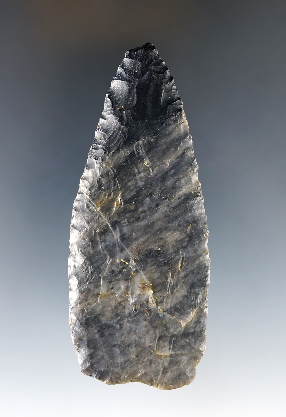 3 3/8" Paleo Lanceolate that is thin and well flaked from Coshocton Flint. Madison Co., Ohio. 