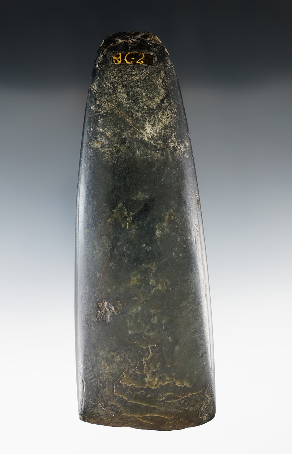 Fine highly polished Celt made from dense faceted Hardstone.