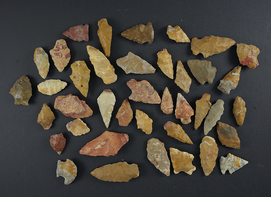 Set of 39 colorful points made from Cobble Jasper found on the Eastern Shore .