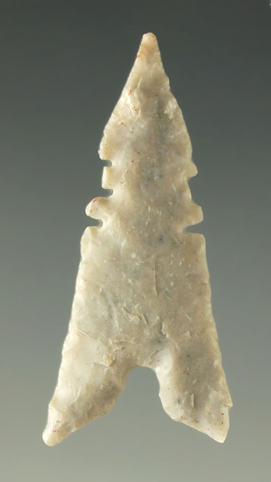 Ex. Museum! Excellent serrations and style on this 1 1/4" Garza point found in Texas. Ex. Shewey.