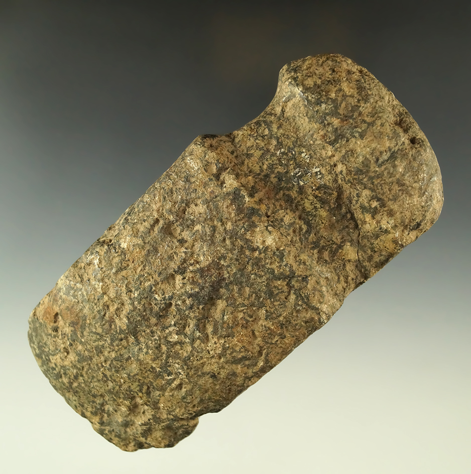 5 1/8" block style Axe with some ancient damage to one side that is very well defined. COA.