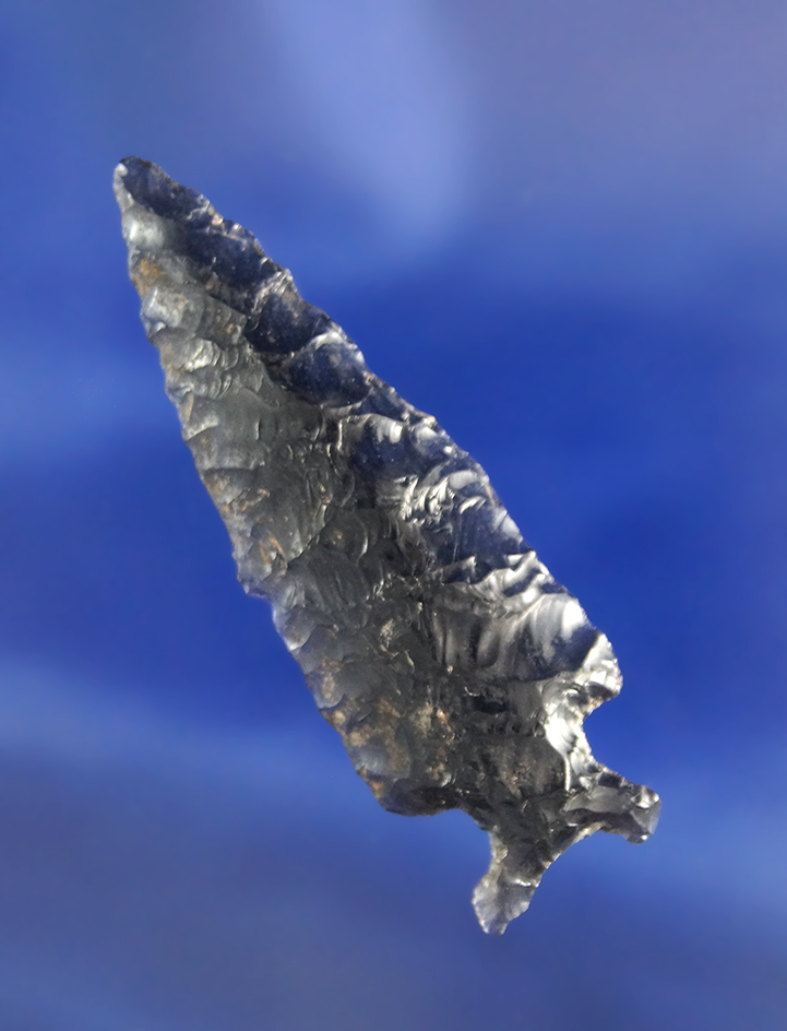 Excellent flaking on this 1 15/16" Obsidian Cornernotch point found in Oregon.