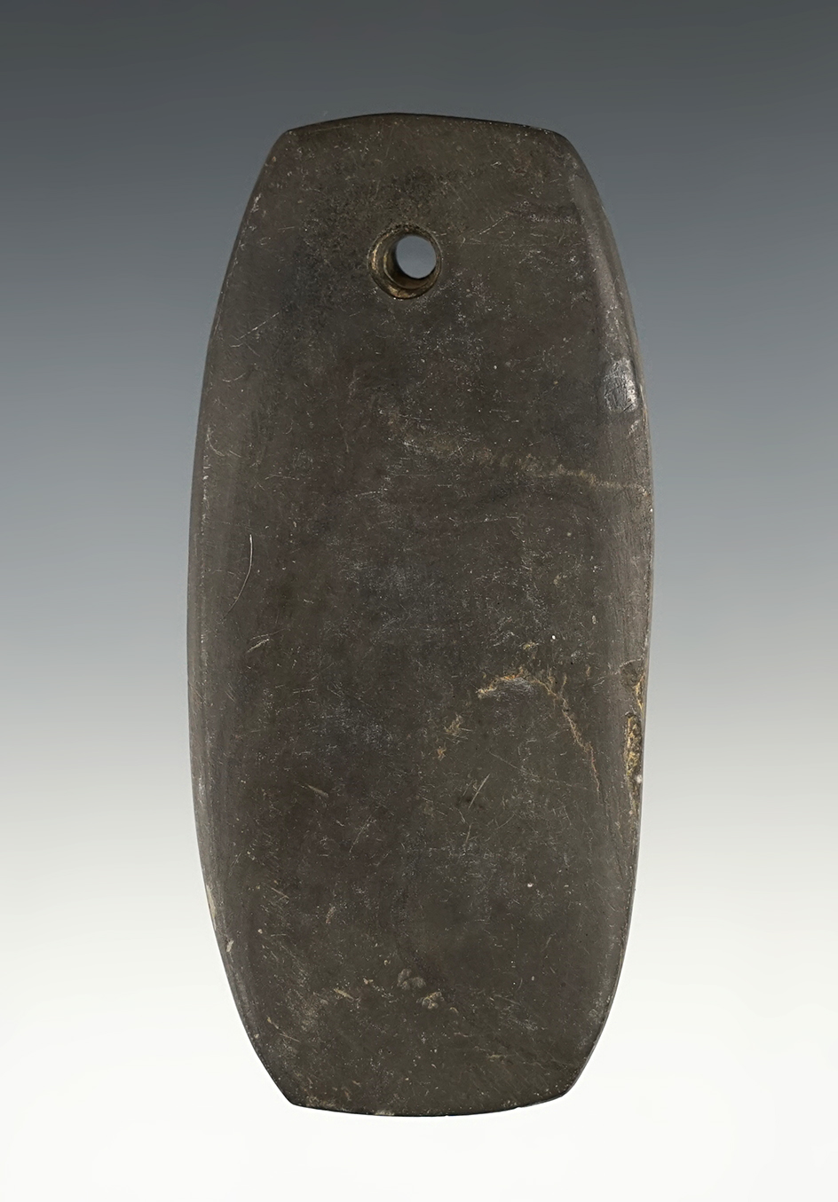 3 5/8" Trapezoidal Pendant found in Butler Co., Ohio. Made from patinated slate.