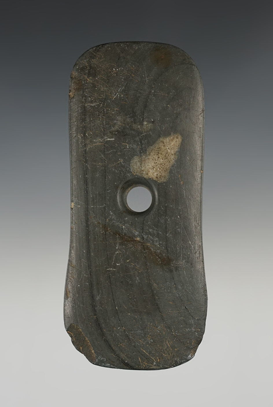 4 3/8" Bi-Concave Pendant with excellent age on the surface. Found in Portage Co., Ohio.