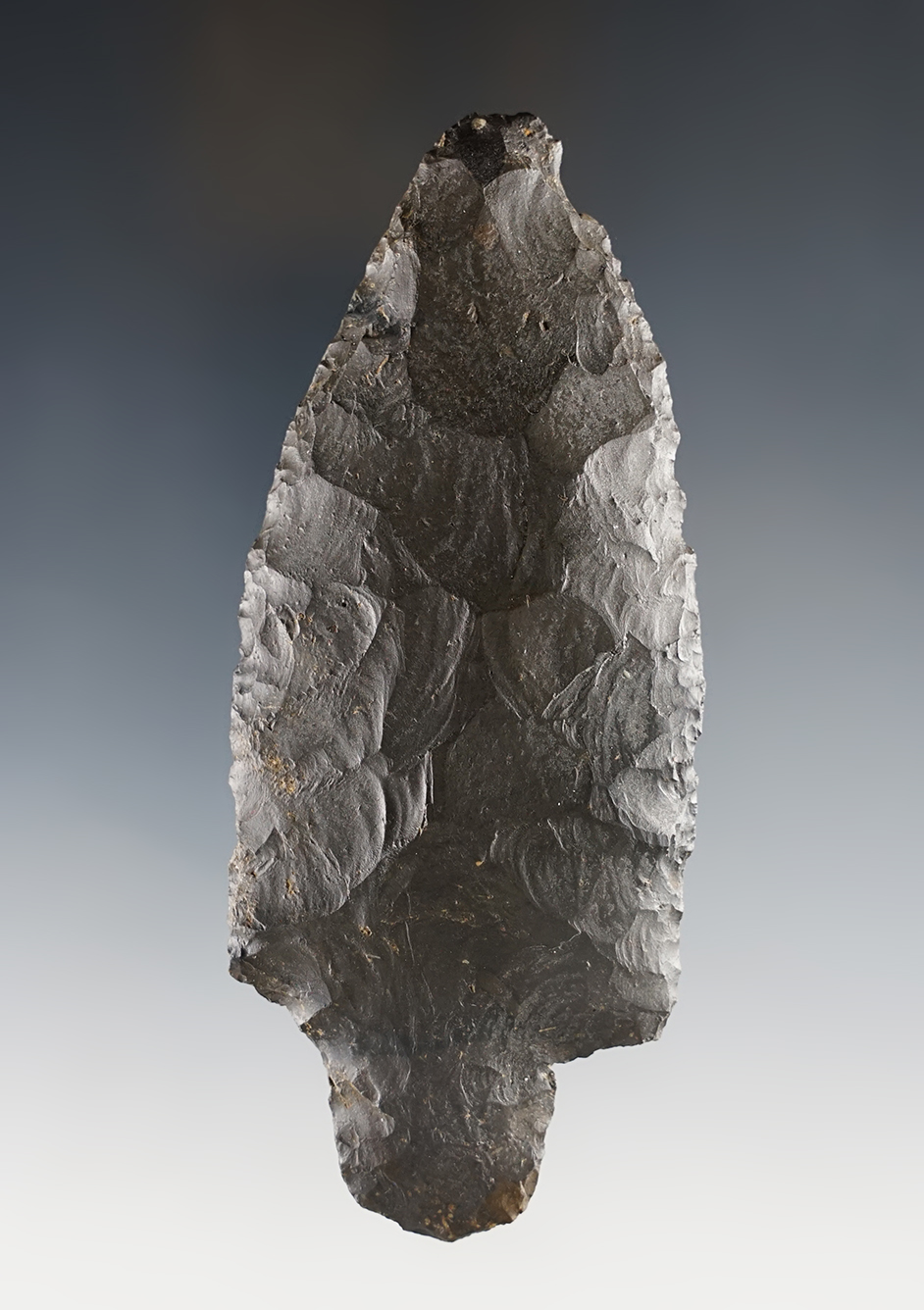 4 1/2" Adena point found in the Midwestern U.S. Shows excellent age on surface. Bennett COA.